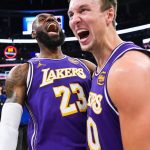 Luka Doncic celebration 60 points Lakers vs Heat NBA mars 2026
