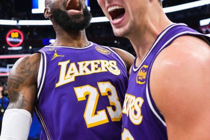 Luka Doncic celebration 60 points Lakers vs Heat NBA mars 2026