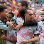 Joueurs belges célèbrent un but contre le Sénégal en Coupe du Monde 2026