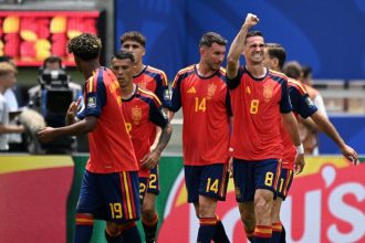 Joueurs de l'Espagne célébrant un but face à la Belgique en quart de finale de la Coupe du monde 2026