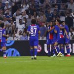 Les joueurs du PSG célèbrent un but au Vélodrome pendant le Classique contre l'OM