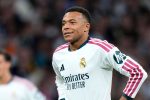 Kylian Mbappé sous le maillot du Real Madrid lors d'un match de Ligue des champions